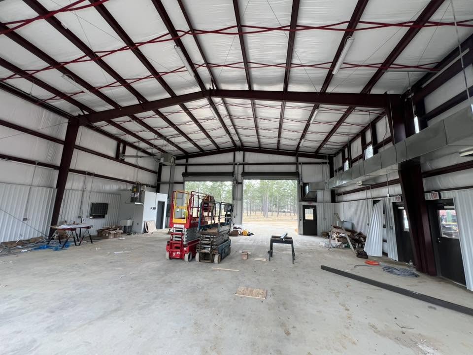 Fire station apparatus bay interior during construction